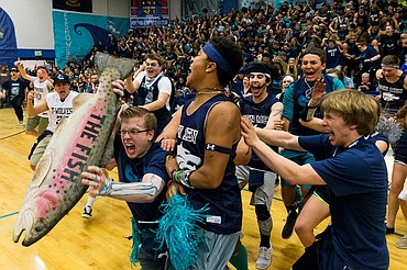 <p>Lake City High School students rush the court after being announced as the winners of the Fight for the Fish, an annual cross-town rivalry spirit competition against Coeur dAlene High School, following a girls and boys basketball game Friday at Coeur dAlene High.</p>
