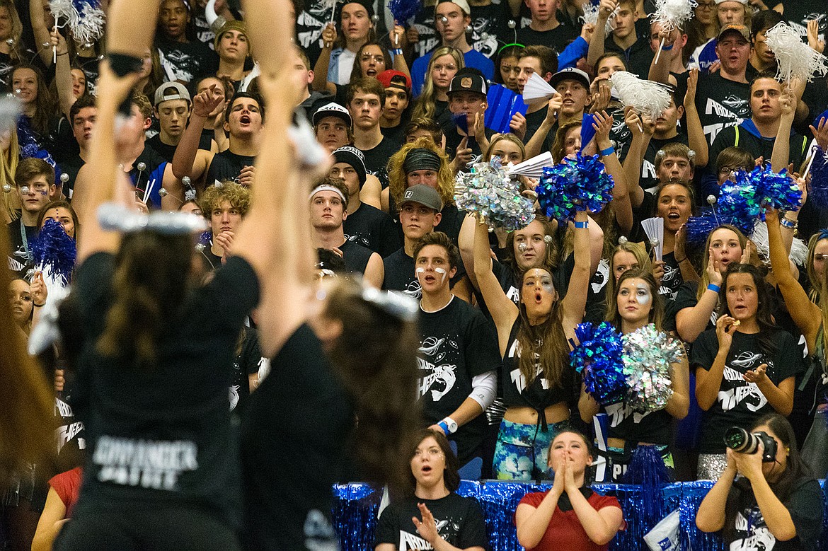 &lt;p&gt;&#160;The Coeur d&#146;Alene High student section cheers during a performance by their cheerleading squad during halftime of the girls game.&lt;/p&gt;