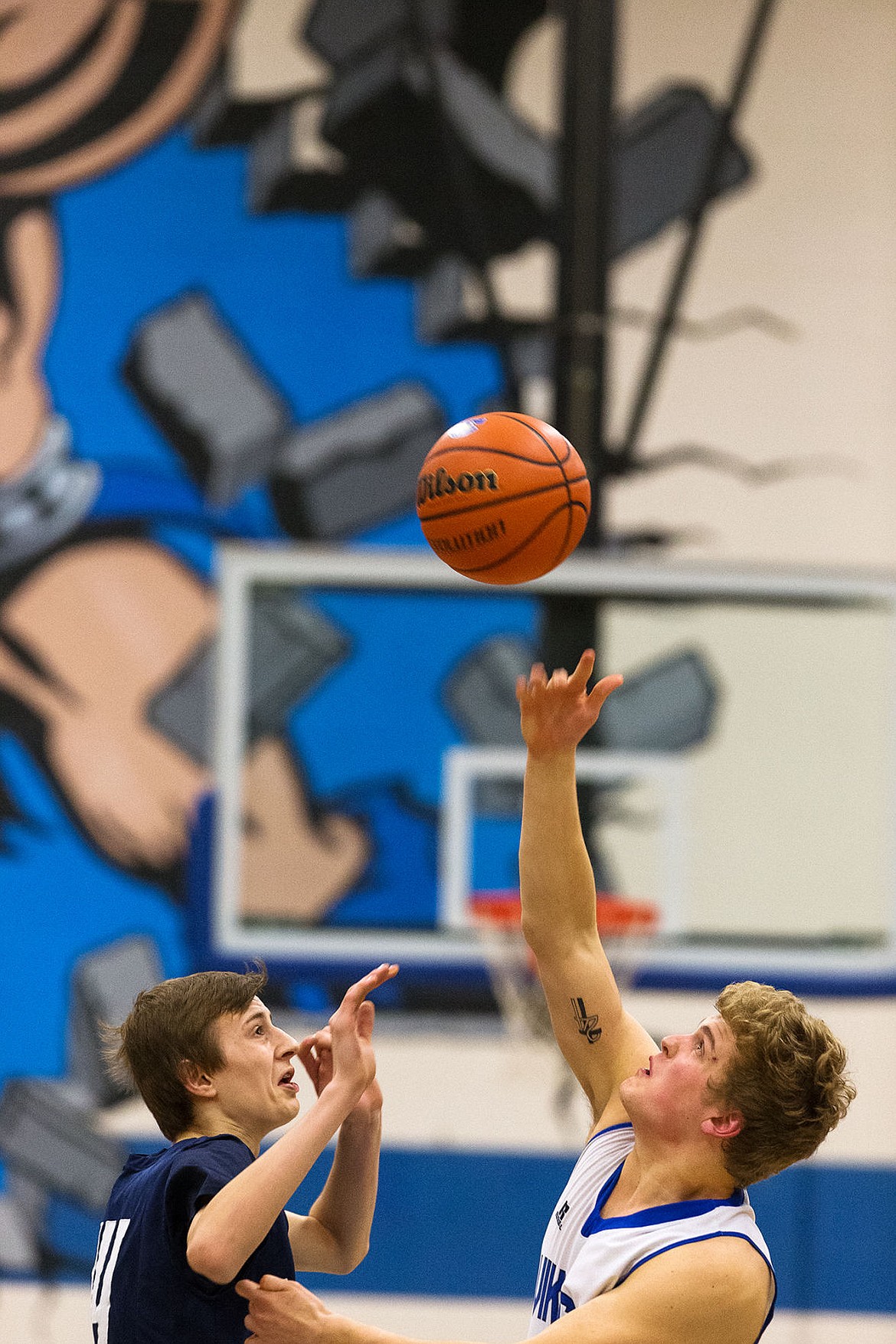 &lt;p&gt;Coeur d&#146;Alene&#146;s Joey Naccarato gets the tip over Lake City&#146;s James Carlson at the start of the boys game on Friday.&lt;/p&gt;