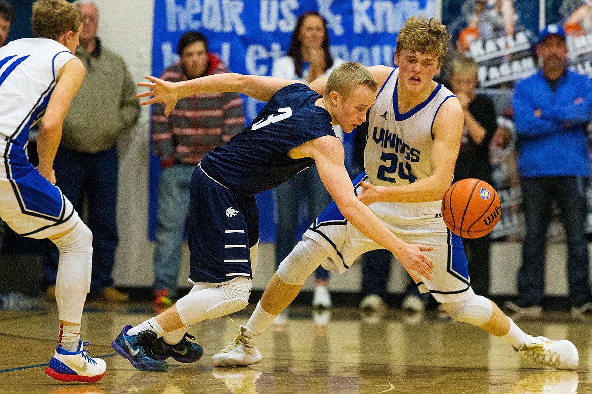 &lt;p&gt;Lake City&#146;s Kodie Kolden (3) knocks the ball loose from Coeur d&#146;Alene&#146;s Joey Naccarato (24) during the first quarter.&lt;/p&gt;