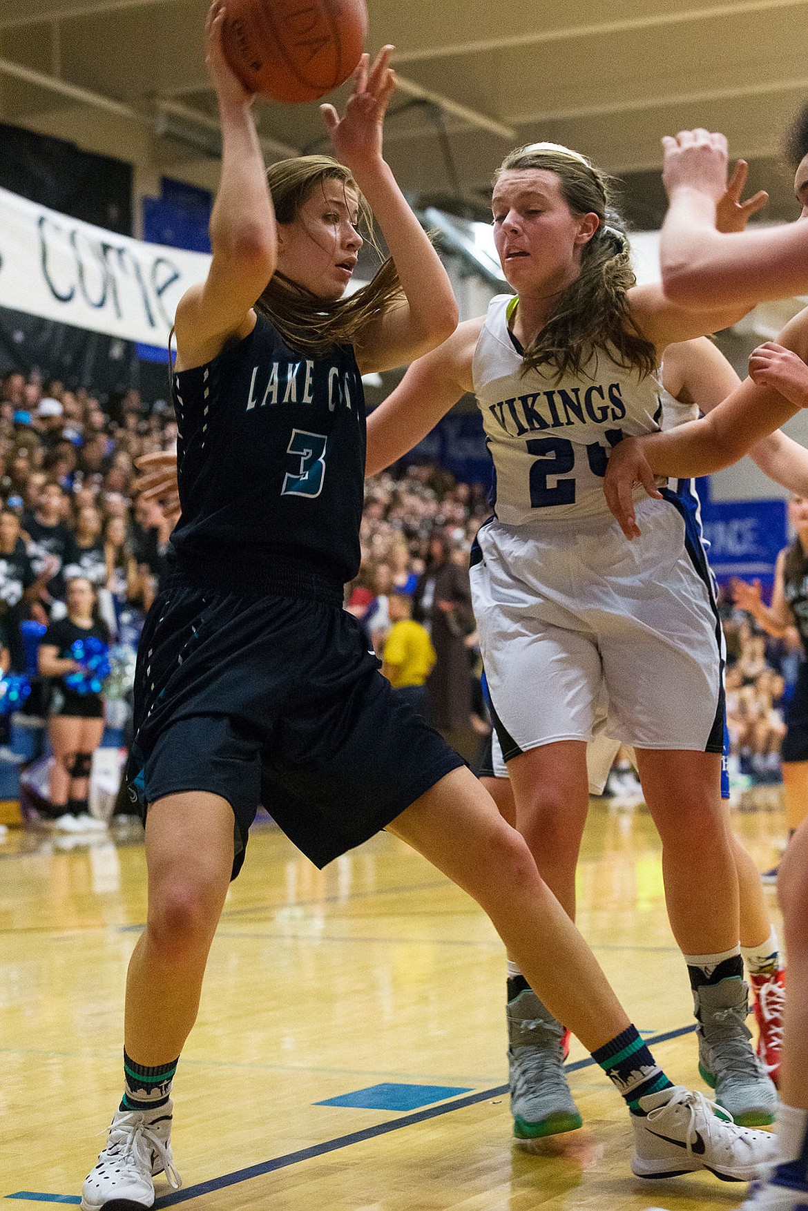 &lt;p&gt;Lake City High School&#146;s Nina Carlson sets up for a shot under the basket against Coeur d&#146;Alene in the first quarter of the girls game.&lt;/p&gt;