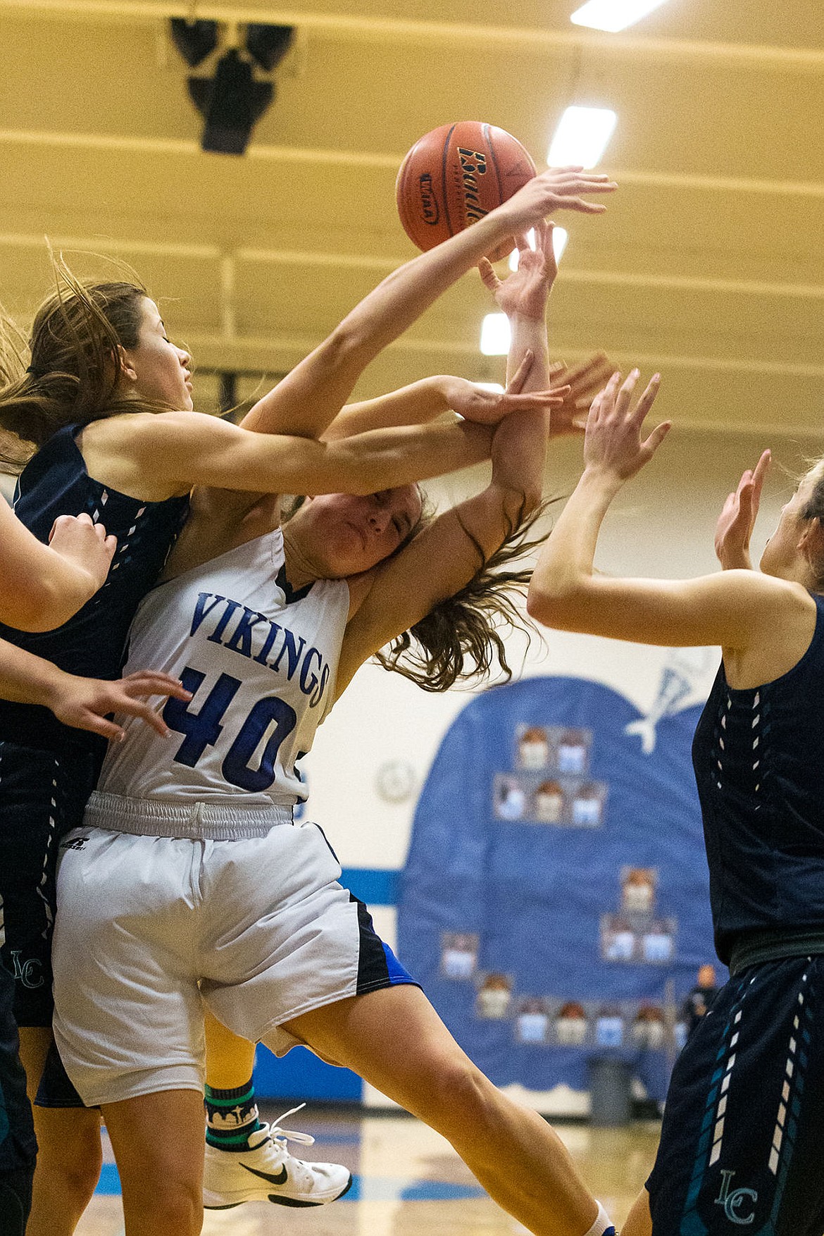 &lt;p&gt;Coeur d&#146;Alene High&#146;s Kelly Horning (40) is fouled by Lake City&#146;s Nina Carlson while taking a shot in the first quarter.&lt;/p&gt;