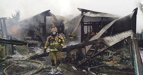 &lt;p&gt;Kootenai County Fire and Rescue Lt. Bryon Smith tends to a shop fire in Post Falls that killed four pot-bellied pigs inside. Kootenai County Fire and Rescue Lt. Bryon Smith tends to a shop fire in Post Falls that killed four pot-bellied pigs inside.&lt;/p&gt;