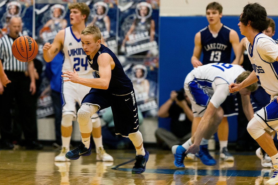 &lt;p&gt;SHAWN GUST/Press Lake City&#146;s Kodie Kolden chases the ball after blocking a Coeur d&#146;Alene High pass during the first quarter.&lt;/p&gt;