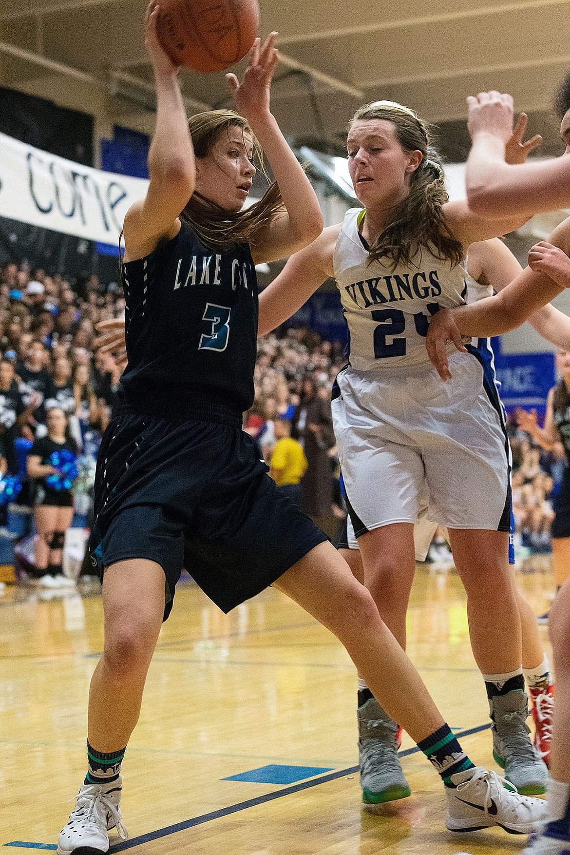 &lt;p&gt;SHAWN GUST/Press Lake City High School&#146;s Nina Carlson sets up for a shot under the basket against Coeur d&#146;Alene in the first quarter of the girls game.&lt;/p&gt;