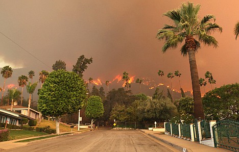 &lt;p&gt;A wildfire burns in the hills just north of the San Gabriel Valley community of Glendora, Calif., on Thursday. Southern California authorities have ordered the evacuation of homes at the edge of a fast-moving wildfire burning in the dangerously dry foothills of the San Gabriel Mountains.&lt;/p&gt;