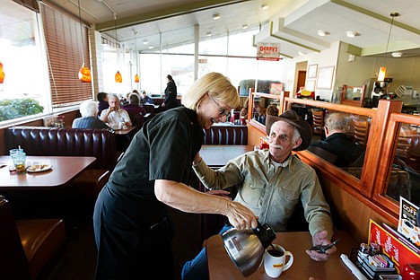 &lt;p&gt;Shirley Prosch pours a cup of coffee for lint-time regular Dan Cooley during her last shift before retiring.&lt;/p&gt;