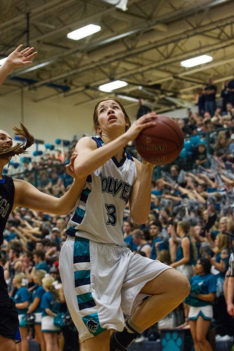 &lt;p&gt;Lake City's Nina Carlson (3) attempts a shot Friday night at the girls game.&lt;/p&gt;