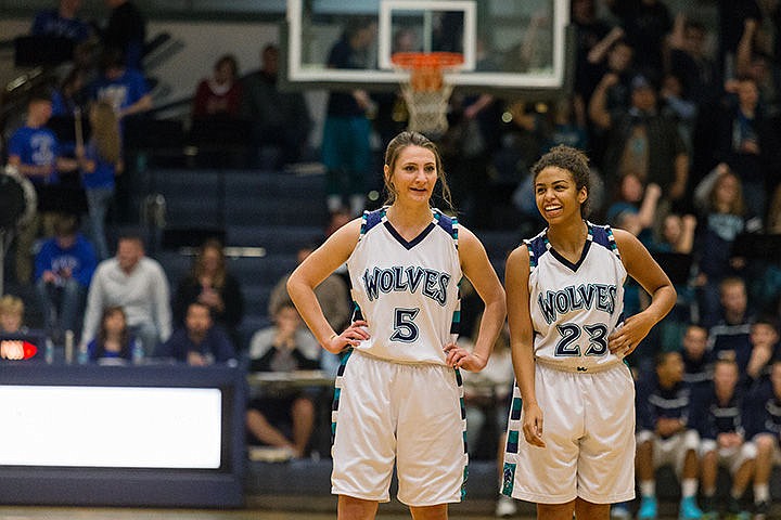 &lt;p&gt;Lake City players Natalie Wheelock (5) and Whitney Meier share a laugh during the Fight for the Fish.&lt;/p&gt;