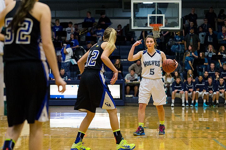 &lt;p&gt;The Timberwolves&#146; Natalie Wheelock signals the play against Coeur d&#146;Alene High School.&lt;/p&gt;