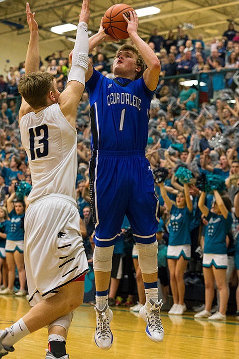 &lt;p&gt;Coeur d&#146;Alene&#146;s Joe Naccarato (1) goes up for a jump shot against Lake City&#146;s Collin Hunter (13).&lt;/p&gt;