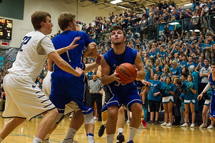 &lt;p&gt;Elliott Sparks (30) prepares for a shot during the fourth quarter of the boys game.&lt;/p&gt;