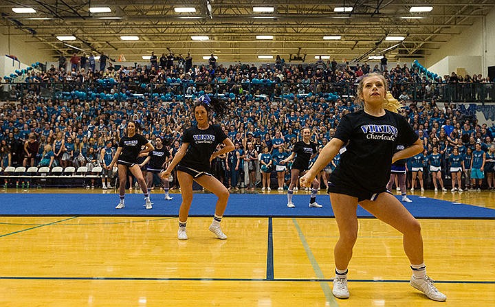 &lt;p&gt;Coeur d&#146;Alene High senior Hayley Kaiser performs with the Viking cheerleaders between the girls&#146; and boys&#146; basketball games on Friday night.&lt;/p&gt;