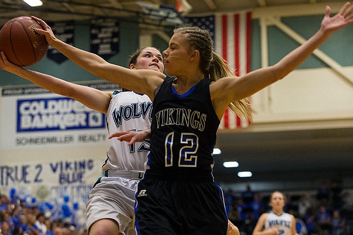 &lt;p&gt;Coeur d&#146;Alene&#146;s Emily Callahan (12) blocks a shot by Lake City&#146;s Olivia Maryon in the second half.&lt;/p&gt;