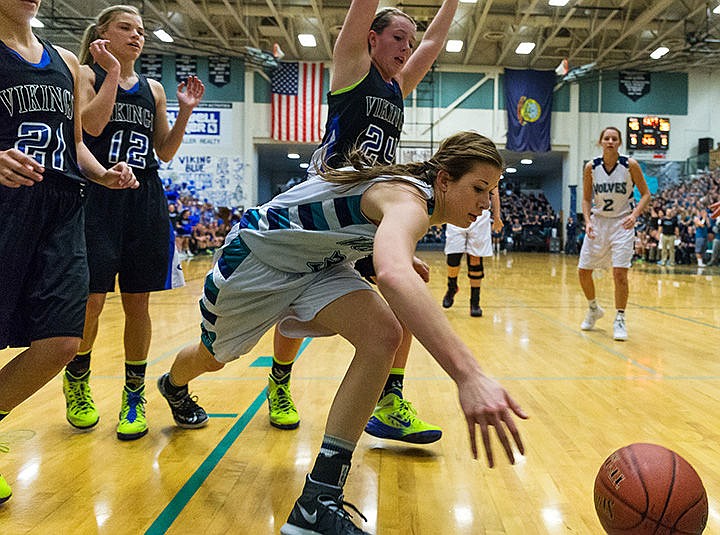 &lt;p&gt;Lake City High&#146;s Nina Carlson chases a loose ball out of bounds in the third quarter.&lt;/p&gt;