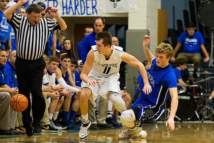 &lt;p&gt;Coeur d&#146;Alene&#146;s Joe Naccarato slips to the floor while racing Lake City&#146;s Michael Goggin for a loose ball near the sideline in the second half.&lt;/p&gt;