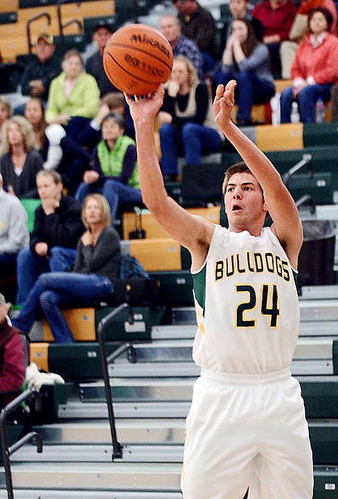 <p>Whitefish senior Art Doorn (24) takes a shot for three during the game against Plains on Friday, January 17, in Whitefish. (Brenda Ahearn/Daily Inter Lake)</p>