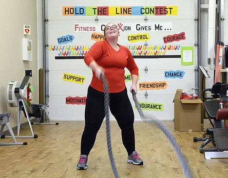 &lt;p&gt;Katie Barling makes a wave with weighted ropes during her workout at Fitness Connexion in Bloomington, Ill., Dec. 1, 2014.&lt;/p&gt;