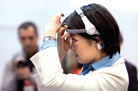 &lt;p&gt;In this Jan. 13, 2012 photo, a member of the media tries on a Haier Brain Wave TV headset at the 2012 International Consumer Electronics show in Las Vegas. The headset, which measures brain waves with one sensor on the wearer?s forehead and another clipped onto an earlobe, can sense if the user wants something on a TV set to go up or down. Haier is selling the set in China, but has no plans to bring it to market in the U.S. (AP Photo/Julie Jacobson)&lt;/p&gt;