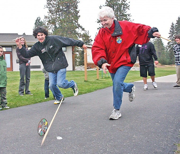 &lt;p&gt;Josh Doney and International Traditional Games Society Executive
Director DeeAnna Leader fire arrows at a rolling hoop Thursday
during the traditional games clinic at SKC. Hoop and arrow is a
traditional game played by members of the Blackfeet tribe. It
quickly became a popular game to play on horseback, Leader
said.&lt;/p&gt;