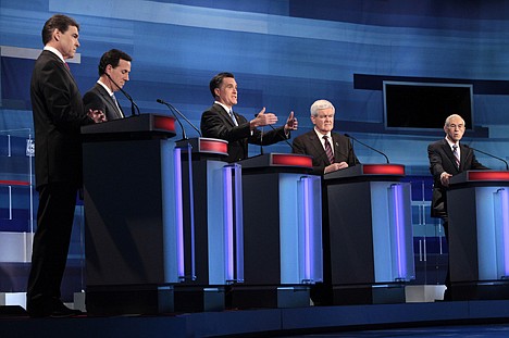 &lt;p&gt;Republican presidential candidates, from left to right: Texas Gov. Rick Perry; former Pennsylvania Sen. Rick Santorum; former Massachusetts Gov. Mitt Romney; former House Speaker Newt Gingrich; and Rep. Ron Paul, R-Texas, participate in the South Carolina Republican presidential candidate debate in Myrtle Beach, S.C., Monday, Jan. 16, 2012. (AP Photo/Charles Dharapak, Pool)&lt;/p&gt;