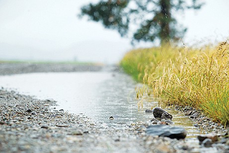 &lt;p&gt;Photos: GABE GREEN/Press Rain falls on West Wyoming Avenue on the Rathdrum Prairie Tuesday afternoon. Rainfall reached record levels Tuesday.&lt;/p&gt;