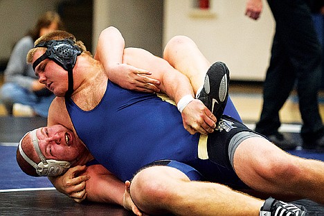 &lt;p&gt;Allen Foote of Timberlake earns near-fall points by turning Orofino's Trevor Hopkins to his back in the first period of the 285-pound championship match.&lt;/p&gt;