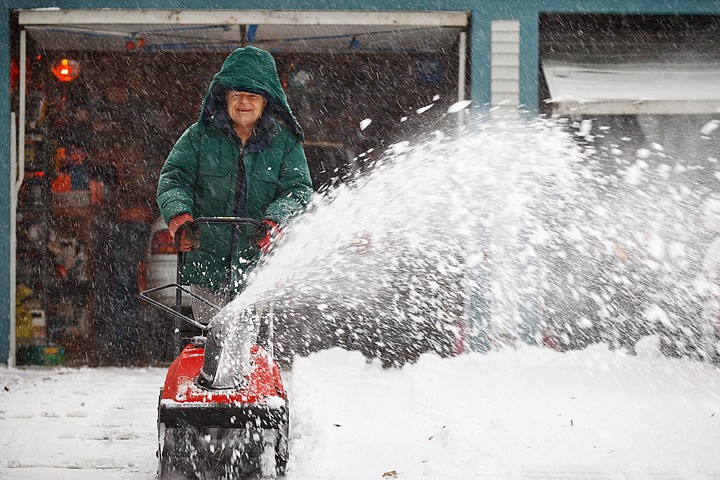 &lt;p&gt;SHAWN GUST/Press Jim Mundy uses a snow blower to clear snow from
his Coeur d'Alene driveway Tuesday as it continues to snow around
him. The winter storm is expected to drop several more inches of
snow through Thursday afternoon.&lt;/p&gt;