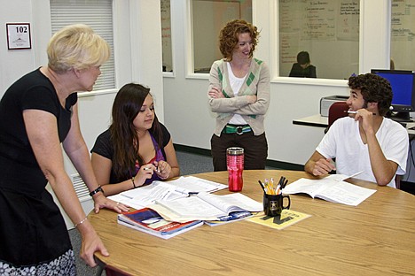 &lt;p&gt;North Idaho College Idaho Basic Education and Skills Training (I-BEST) Adviser/Data Analyst Judith George, left, counsels Chealsie Roberts and Victor Barbierri, seated, along with NIC I-BEST Coordinator Molly Kreyssler.&lt;/p&gt;