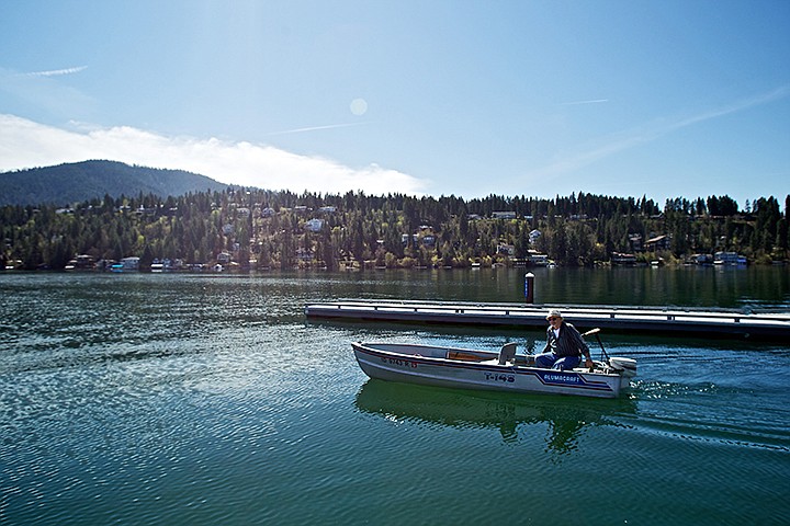 &lt;p&gt;Pete Eller test drives his new 14-aluminum boat Monday, April 23, as he casts off from the Honeysuckle boat launch at Hayden Lake.&#160;&lt;/p&gt;