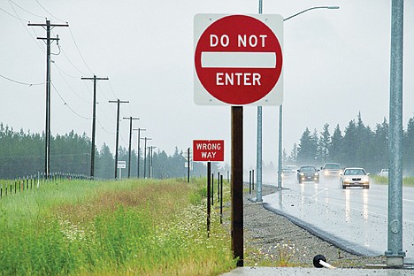 &lt;p&gt;GABE GREEN/Press Cars drive through heavy rain South bound on Highway 95 Tuesday afternoon.&lt;/p&gt;