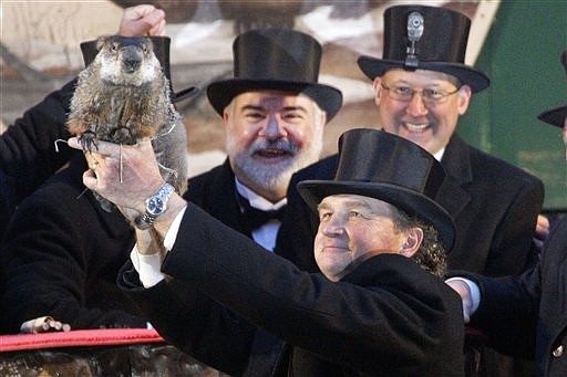 &lt;p&gt;Groundhog Club handler John Griffiths holds Punxsutawney Phil,
the weather prognosticating groundhog this morning during the 126th
celebration of Groundhog Day on Gobbler's Knob in Punxsutawney, Pa.
Phil saw his shadow, forecasting six more weeks of winter weather.
(AP Photo/Gene J. Puskar)&lt;/p&gt;