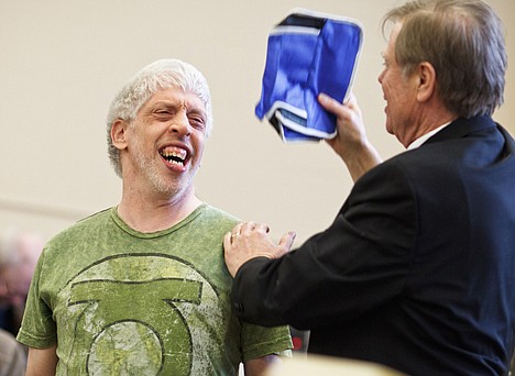 &lt;p&gt;Ron Cava, a client with TESH, Inc. reacts as he is recognized by KHQ meteorologist George Maupin Thursday during the eleventh annual Celebration of Stars. The event honors all TESH Clients for the progress they've made toward independence throughout the year.&lt;/p&gt;