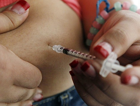 &lt;p&gt;A 19-year old diagnosed with diabetes gives herself an injection of insulin at her home in the Los Angeles suburb of Commerce, Calif. on April 29, 2012.&lt;/p&gt;