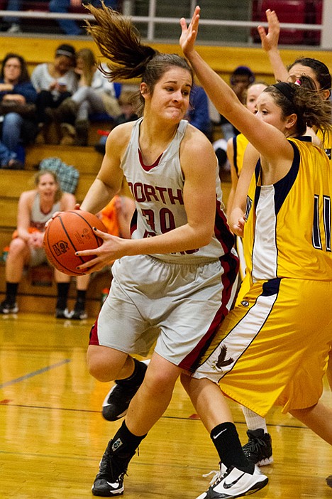 <p>Renae Mokrzycki, of North Idaho College, drives to the hoop in the second half.</p>