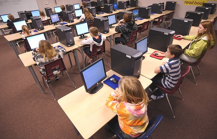 Students at Smith Valley School work on a make-up exam of the MAP (Measuring Academic Progress) test on Friday in Kalispell. One positive thing to come out of consolidation at Smith Valley is this computer lab.