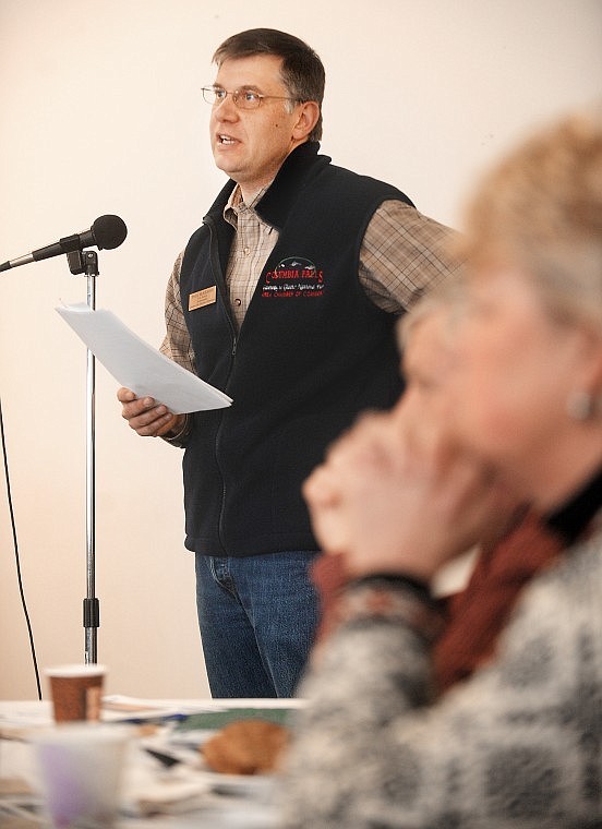 Paul McKenzie gives the opening address at his first Chamber meeting as president on Tuesday in Columbia Falls.