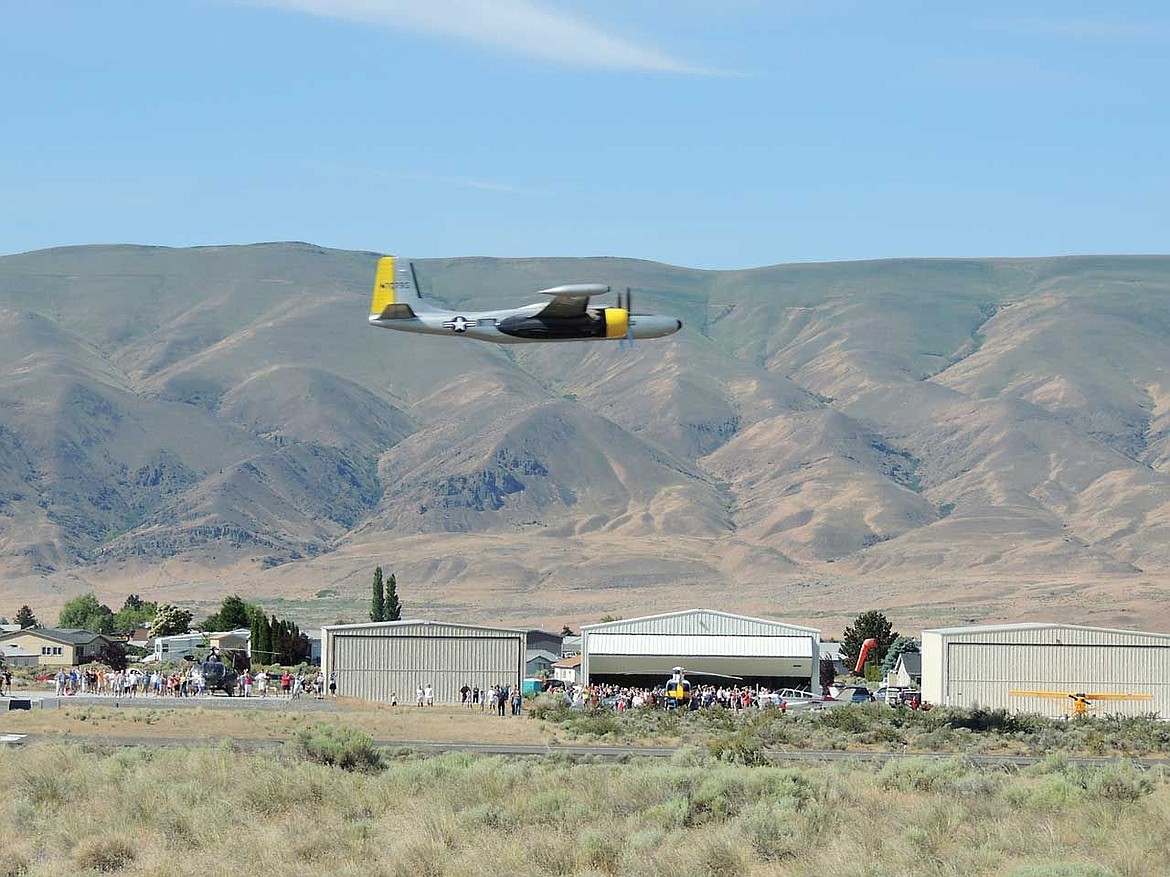 The Desert Aire Airport will be able to handle larger planes after construction of the new flight line is completed. This World War II A-26 Invader was able to do only a fly-over in 2013 at the annual Desert Aire Fly-in and Breakfast.