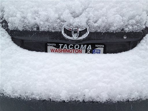 &lt;p&gt;Snow piles up on a car bumper in Tacoma, Wash., Wednesday, Jan.
18, 2012. A widespread snowstorm walloped western Washington on
Wednesday with the heaviest blow missing Seattle and hitting the
Olympia area, causing accidents, closing schools and canceling
flights at Sea-Tac Airport. (AP Photo/Ted S. Warren)&lt;/p&gt;