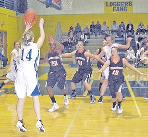 &lt;p&gt;The Lady Loggers&#146; Hannah England attempted a three-pointer in
the second half against the Frenchtown Lady Broncs. Libby dropped
the contest desoite a valiant effort.&lt;/p&gt;