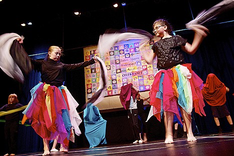 &lt;p&gt;Nikki Cicero, left, and Gracie Messier perform with other Skyway Elementary students during the 28th annual Human Rights' Celebration held Friday at North Idaho College.&lt;/p&gt;