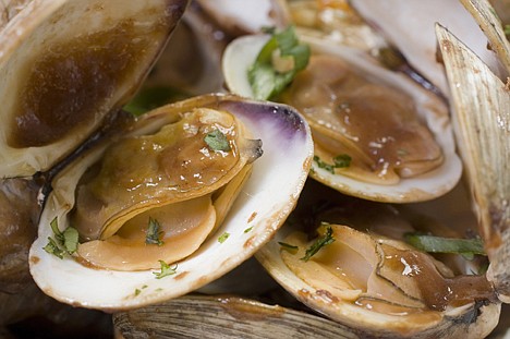 &lt;p&gt;This photo shows clams with black bean paste and scallions.&lt;/p&gt;