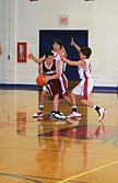 Todd Myrstol holds the ball away from a Superior defender during Tuesday night's game.