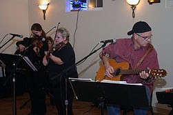 Thompson Falls music group High Strung performs at the Friday evening chili feed at the Elks Lodge in Thompson Falls. High Strung is Chloe Klaus on violin, Leanne Klaus on keyboard, and Caroline Penny on violin with Nat Burgess on guitar.