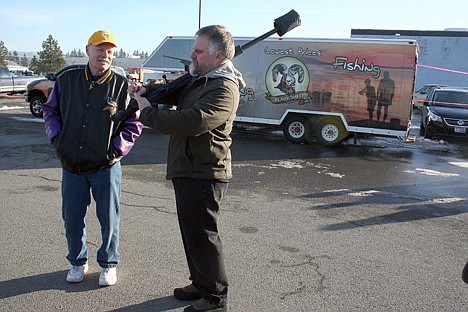 &lt;p&gt;Dale Heimbigner of Coeur d'Alene carries an ArmaLite AR-50 at the Second Amendment rally outside Black Sheep Sporting Goods on Saturday.&lt;/p&gt;