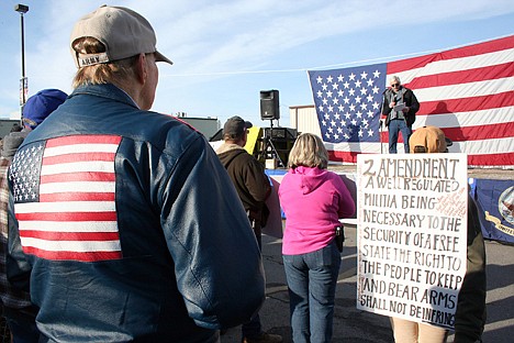 &lt;p&gt;Members of the public sport patriotic memorabilia and pro-gun signs as Rep. Ron Mendive speaks at a Second Amendment on Saturday in Coeur d'Alene.&lt;/p&gt;