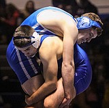 Warden posts seven pins in rout of Ki-Be