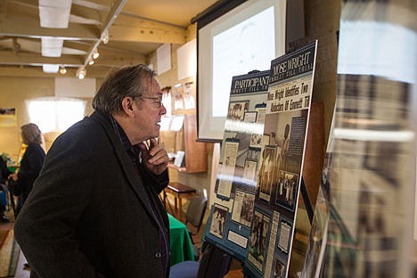 &lt;p&gt;Norman Gissel quietly looks over an Emmett Till trial exhibit before the Martin Luther King Jr. event on Monday at the Human Rights Education Institute in Coeur d'Alene. Gissel was the final presenter at the event where he spoke on the trial.&lt;/p&gt;