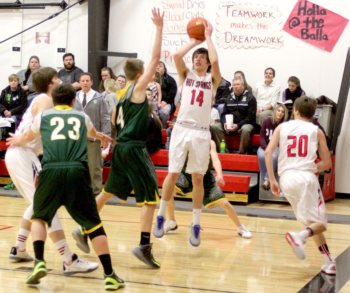 &lt;p&gt;&lt;strong&gt;Zach Osborne shoots for the basket past one of the St. Regis Tigers during their Thursday home game.&lt;/strong&gt;&lt;/p&gt;