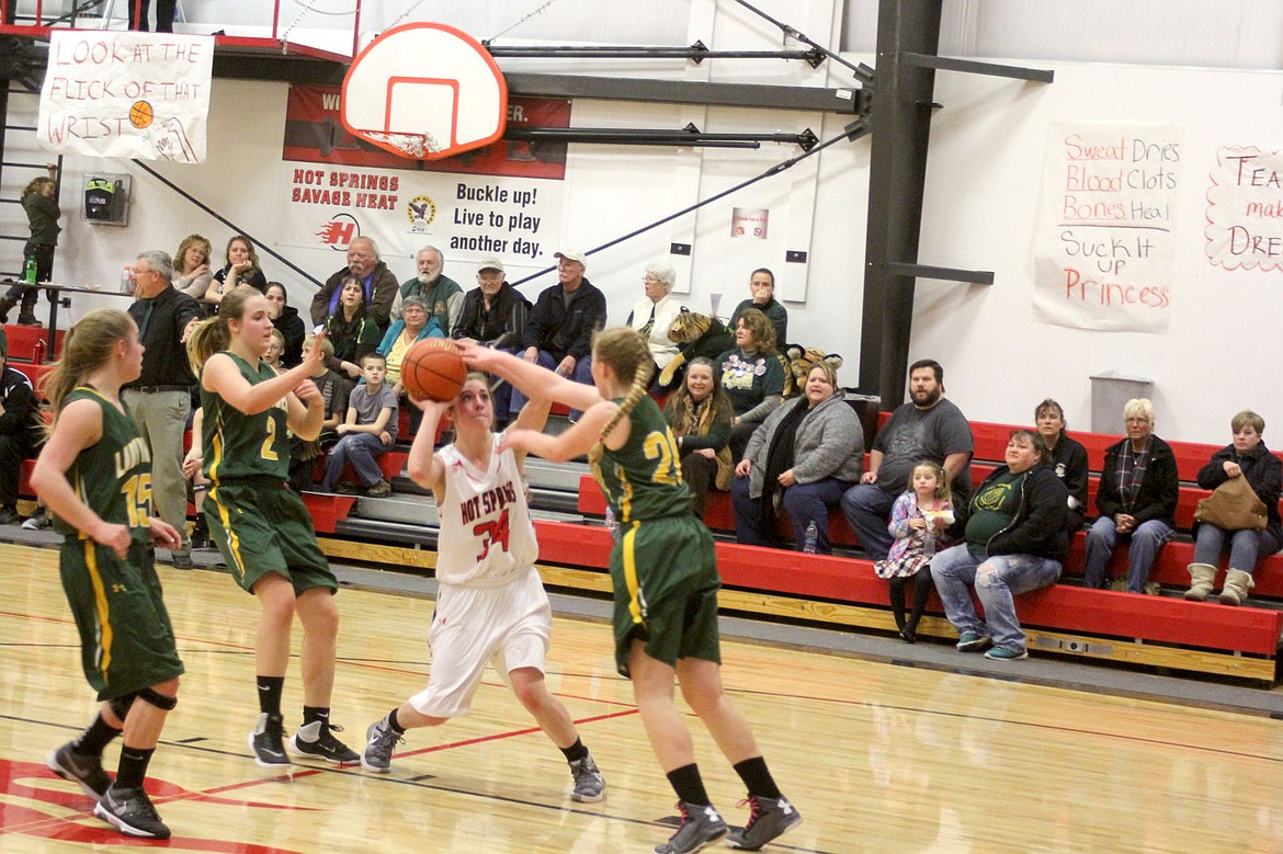 &lt;p&gt;&lt;strong&gt;Karly Lawson goes for a shot past one of the St. Regis Lady Tigers players during their Thursday home game.&lt;/strong&gt;&lt;/p&gt;